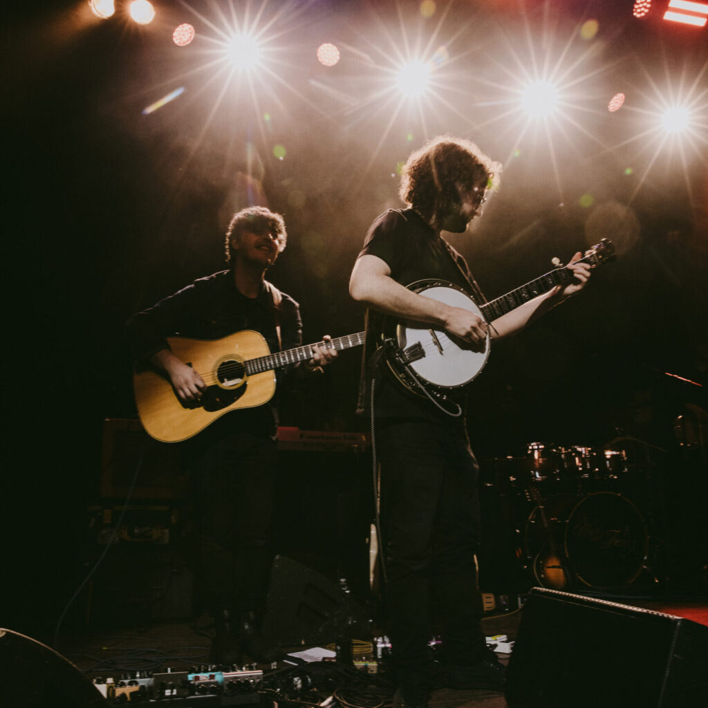 Taylor Shuck playing banjo with The War and Treaty Credit to Savannah Lauren